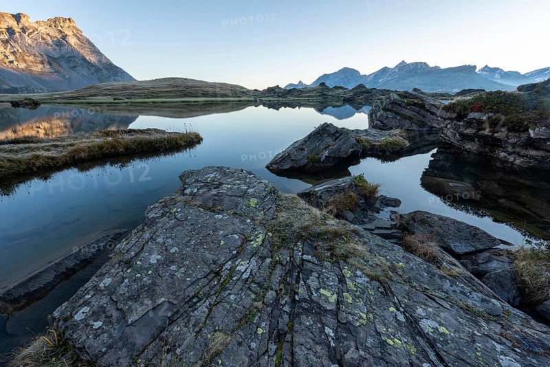 The Blue Lake at sunrise near Melchsee-Frutt on the Aa Alp in the Melch Valley