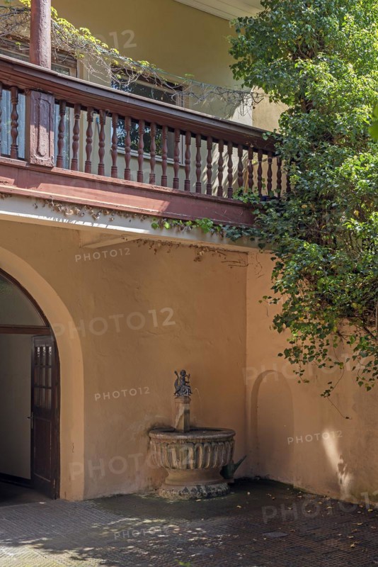 Copy of the historic Dolphin Rider Fountain in a courtyard