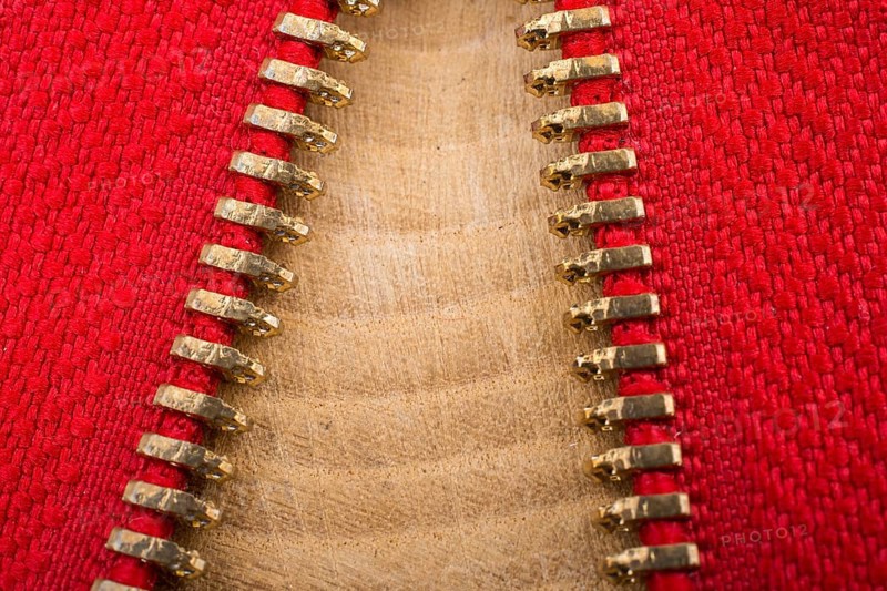 Closeup of a colorful zipper with metal teeth