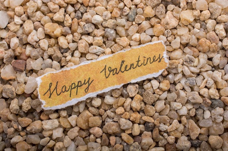 Valentine's day wording on torn paper as Love concept
