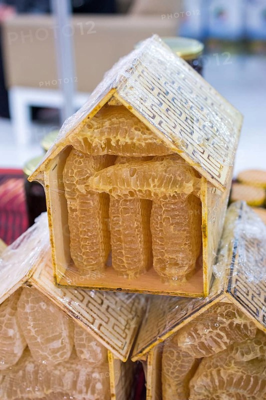Sweet fresh honey in the sealed comb frame