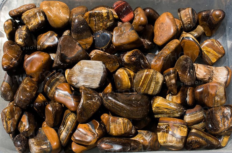 Tiger's eye and hawk's eye gemstone as natural mineral rock specimen