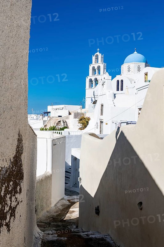 Belltower and Whitewashed architecture in Pyrgos