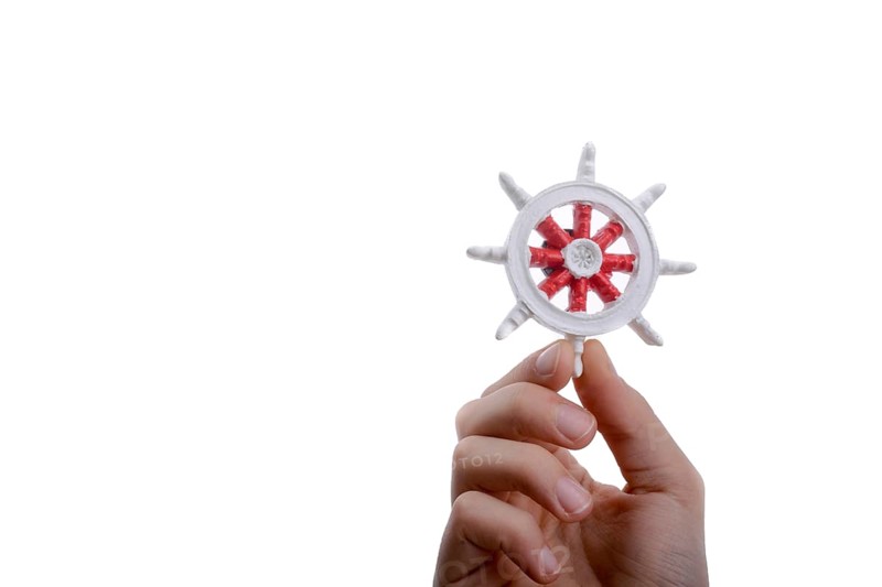 Isolated Ship steering wheel onhand