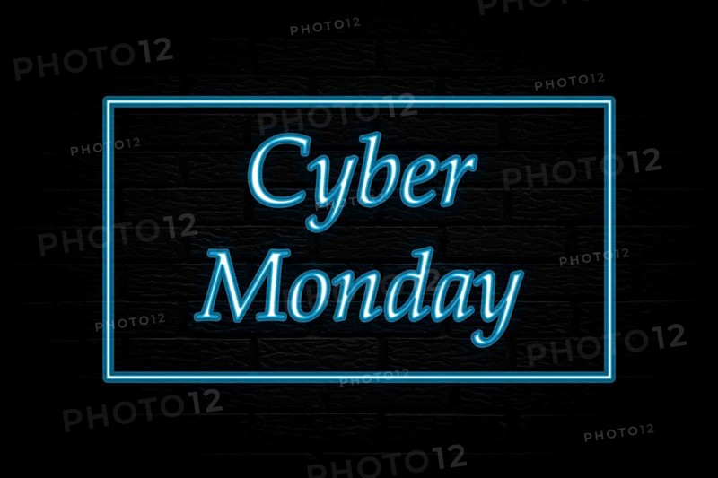 Cyber monday. 3d lettering. Neon lights on black brick background