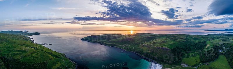 Panorama of Calgary Beach and Bay at sunset from a drone