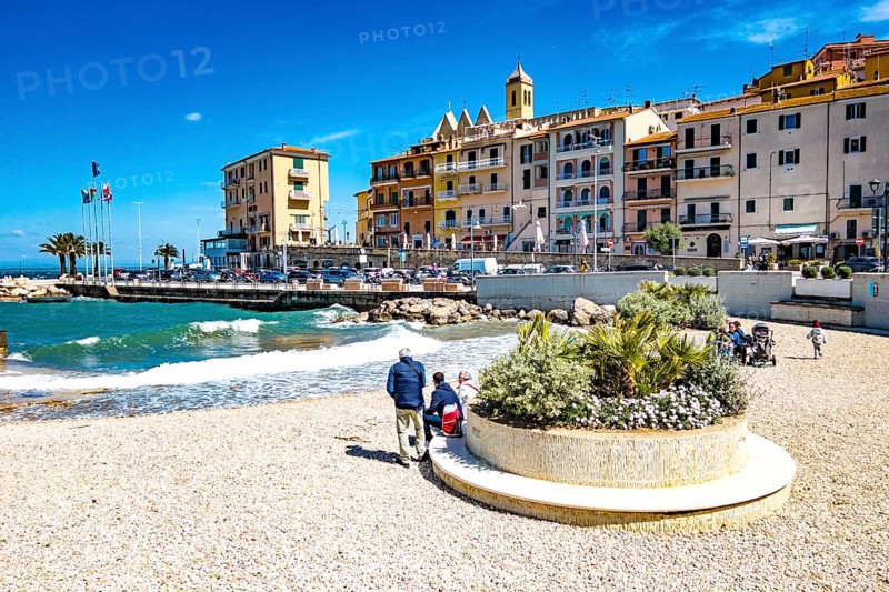 Artificial pebble beach in the old harbour of Porto Santo Stefano