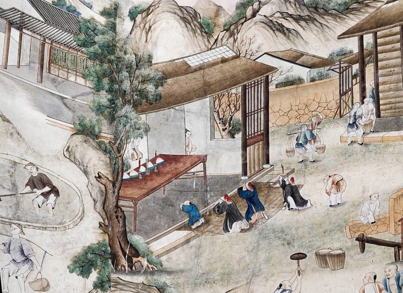 Chinese praying in front of a shrine