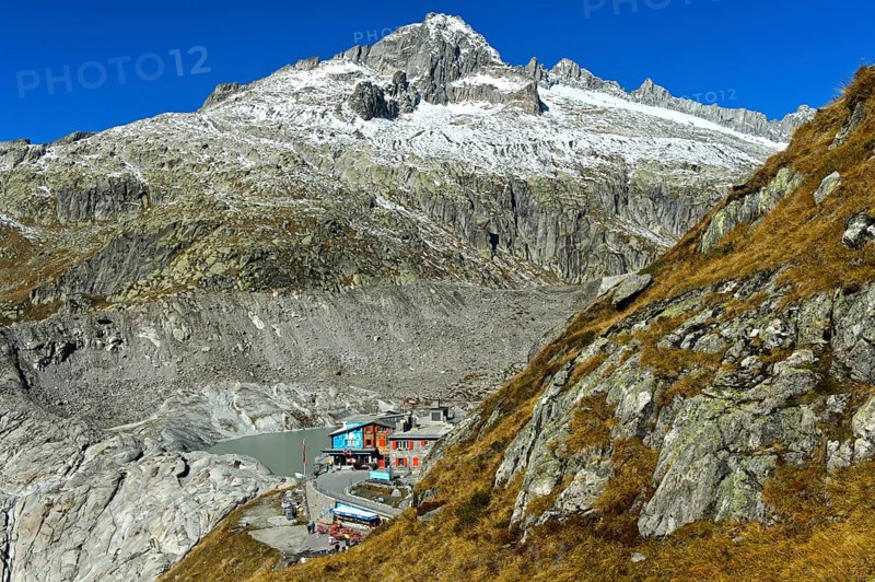 At the entrance to the ice grotto in the Rhone glacier