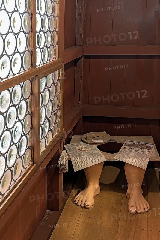 Reconstructed historical dry toilet in a medieval house