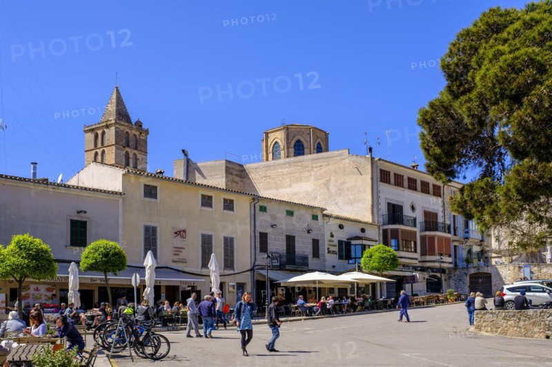 Sidewalk cafes in front of the church