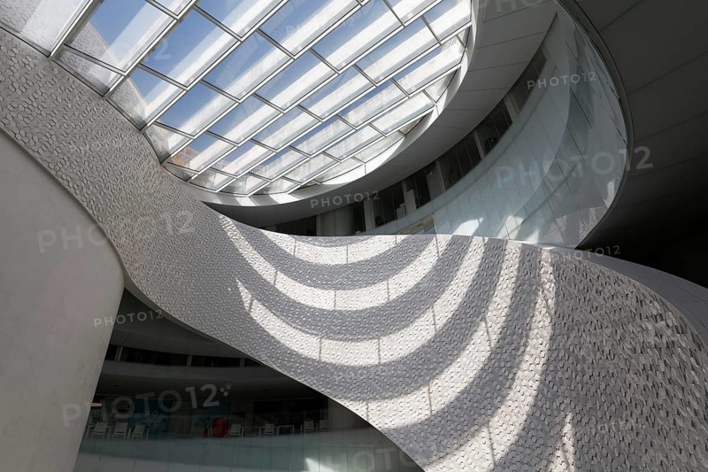 Futuristic atrium with light and shadow
