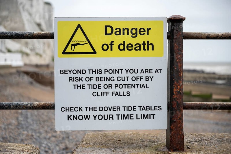 Sign for danger to life due to tidal currents or falls on the cliffs on the coast of St. Margarets Bay
