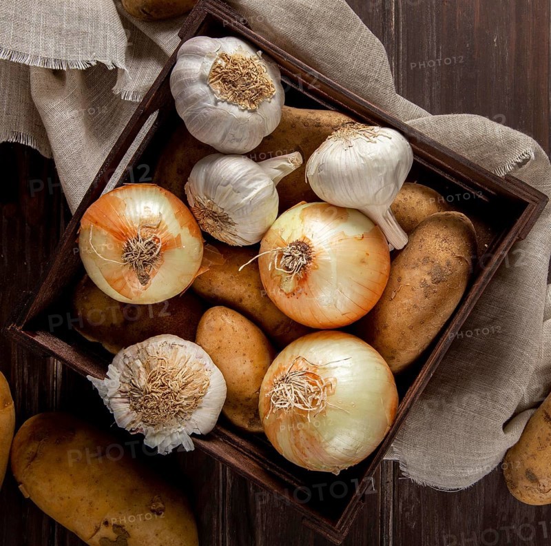 Top view garlic onions crate