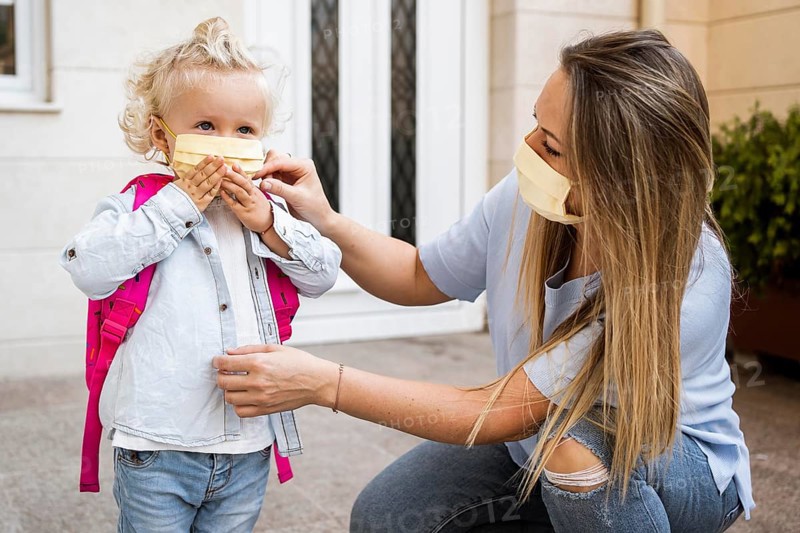 Mother child with medical masks