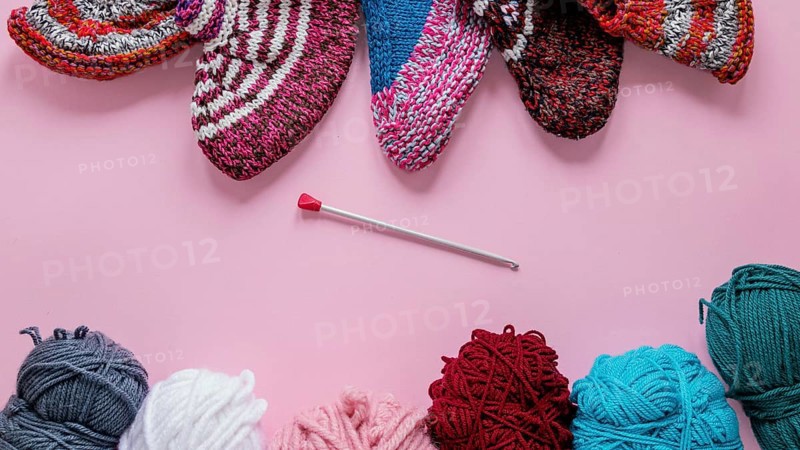 Top view knitting needles wool