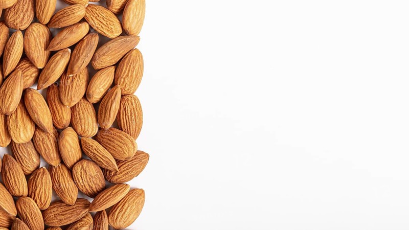 Flat lay almonds with copy space