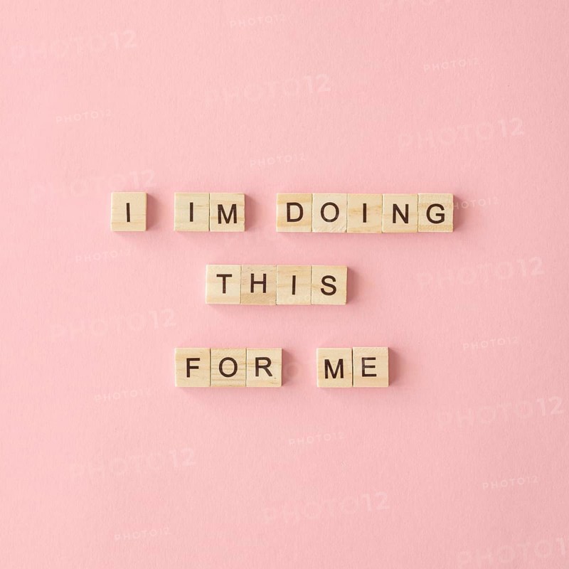 Motivational text pink background