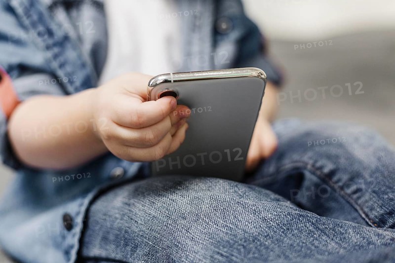 Child using mobile phone