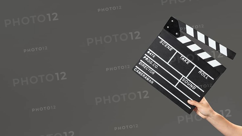 Hand with movie slate
