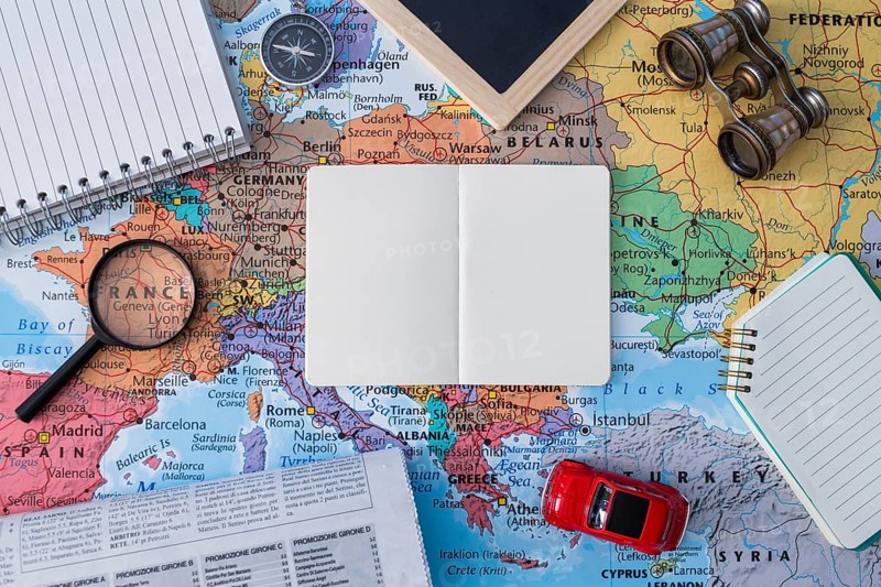 Travel elements composition with open book