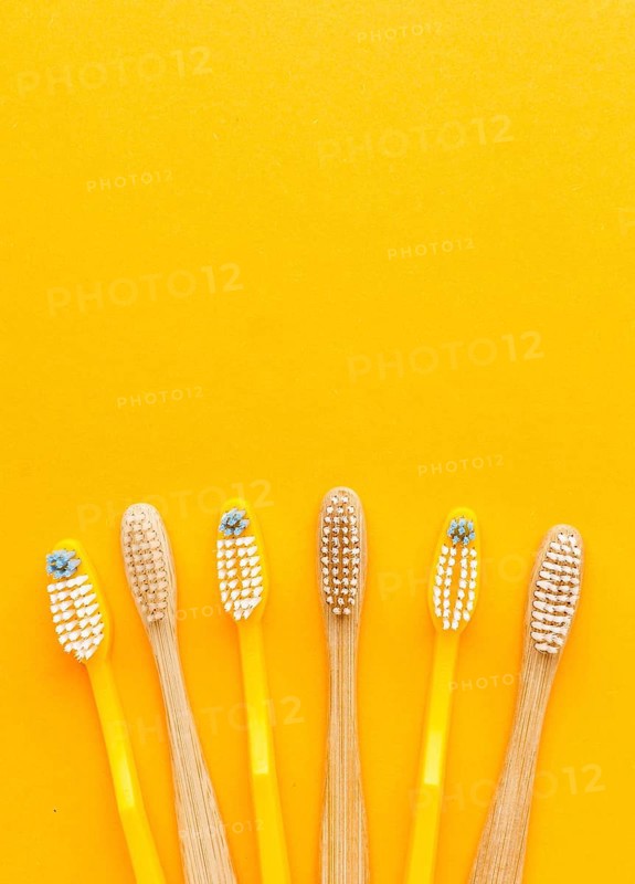 Top view collection organic toothbrushes with copy space