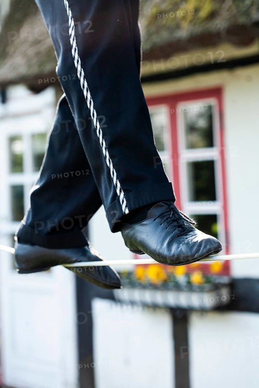 An artist on a tightrope