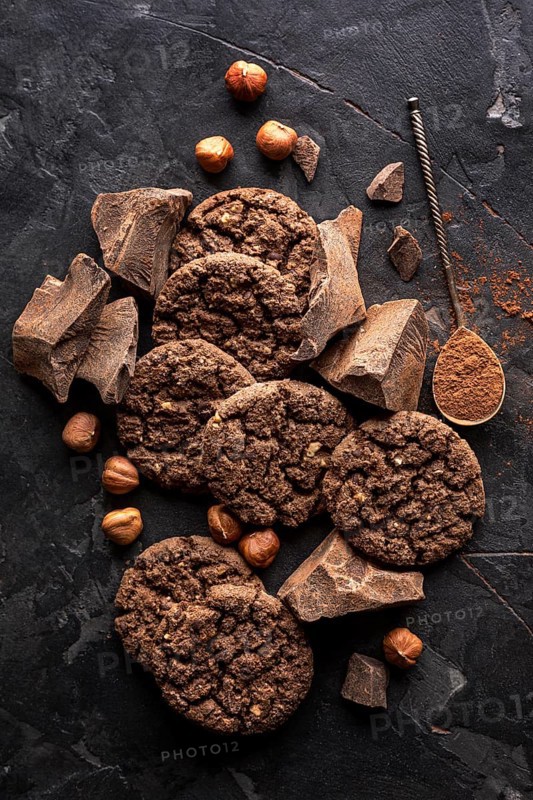 Top view chocolate cookies with hazelnuts cocoa powder
