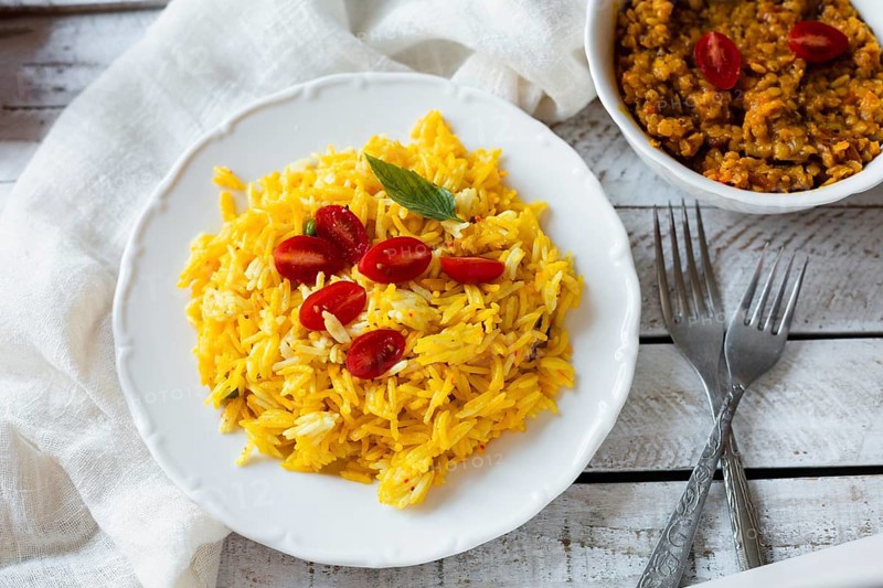 Vegan indian food with rice tomatoes
