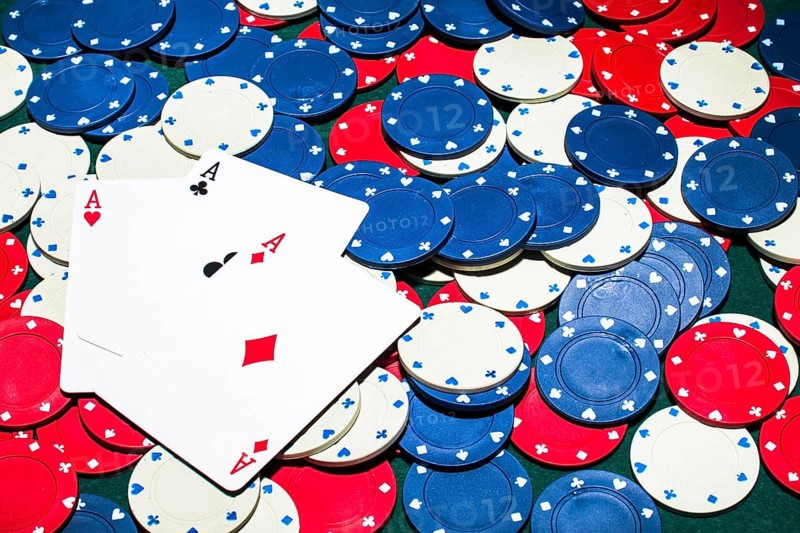 Three aces card white blue red casino chips