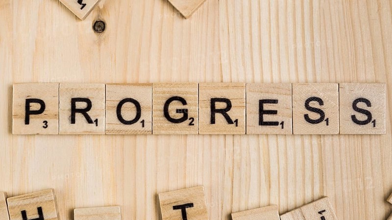 Progress word wooden tiles