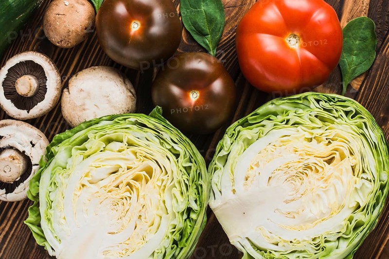 Cabbage near mushrooms tomatoes