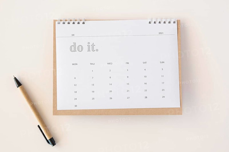 Flat lay planner calendar pen