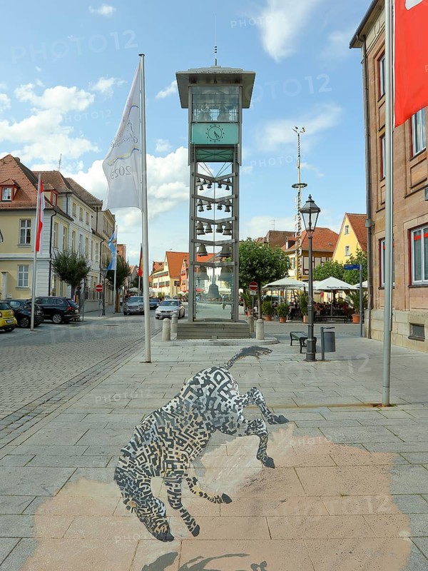 Bell tower with street painting on the historic market square