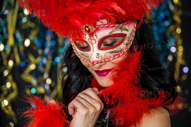 Elegant woman celebrating venetian carnival