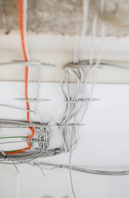Electric cable on the ceiling of a flat