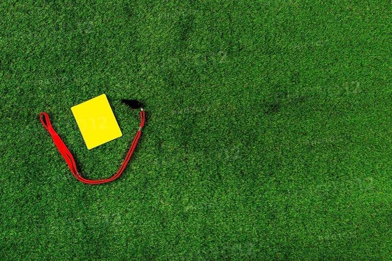 Football composition with copyspace yellow card