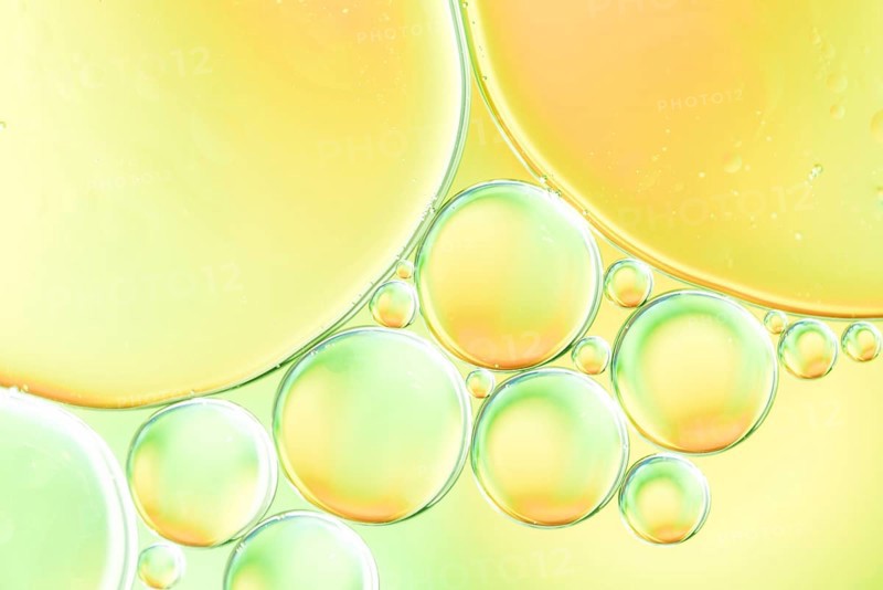 Green yellow bubbles glowing drops