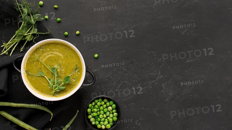 Top view winter peas soup with copy space
