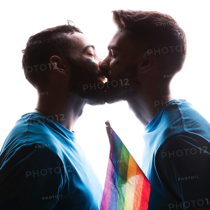 Gay couple kissing tenderly