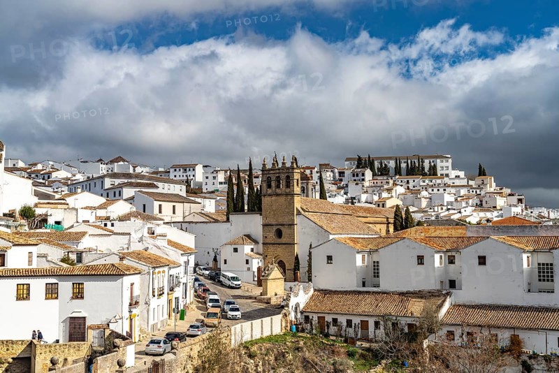 The white houses of the old town with the church Iglesia de Padre Jesus
