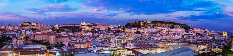 Panorama of Lisbon famous view from Miradouro de Sao Pedro de Alcantara tourist viewpoint in the evening. Lisbon