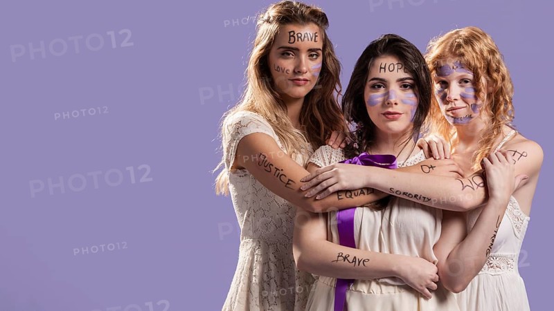 Women posing hugging each other