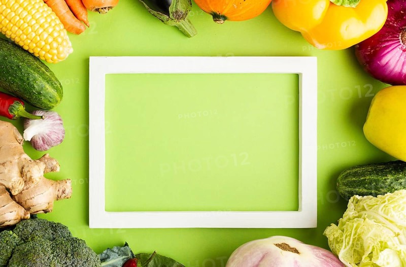 Top view empty frame with arrangement vegetables