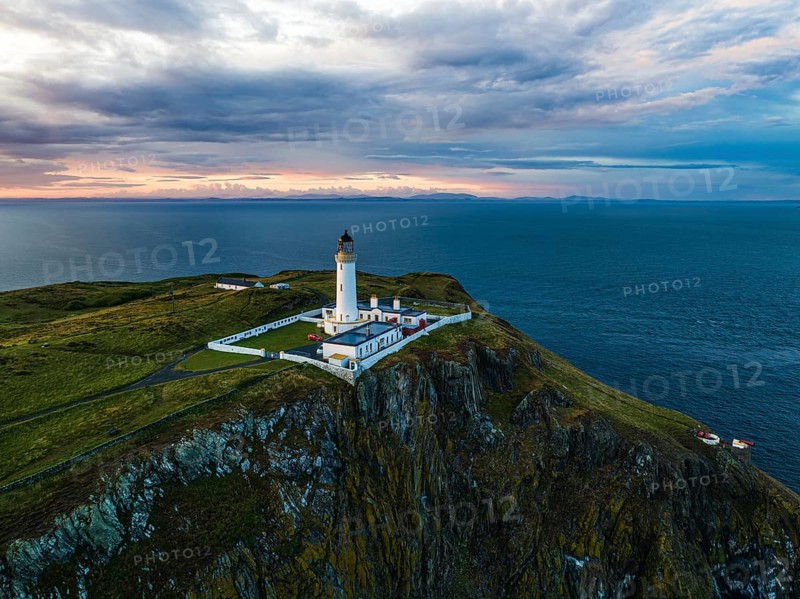 Sunset over Mull of Galloway Lighthouse from a drone