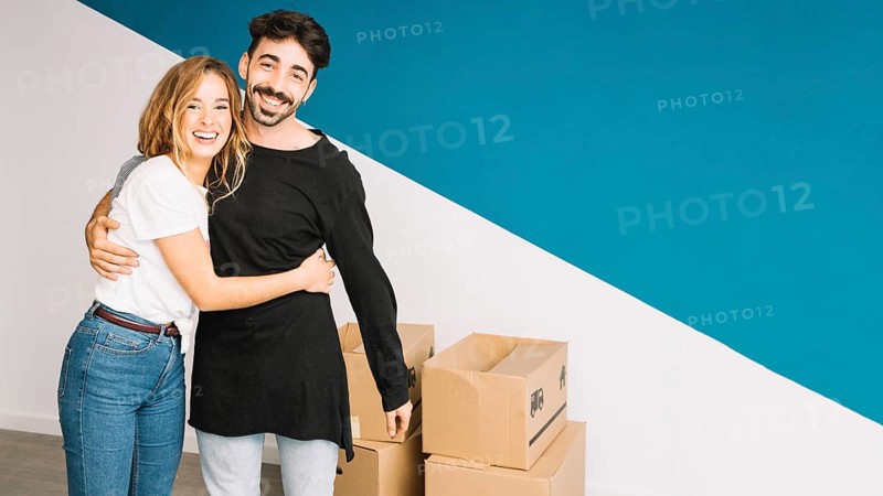 Loving couple moving new flat