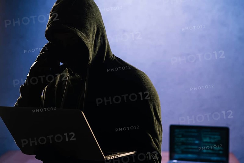Hacker with laptop