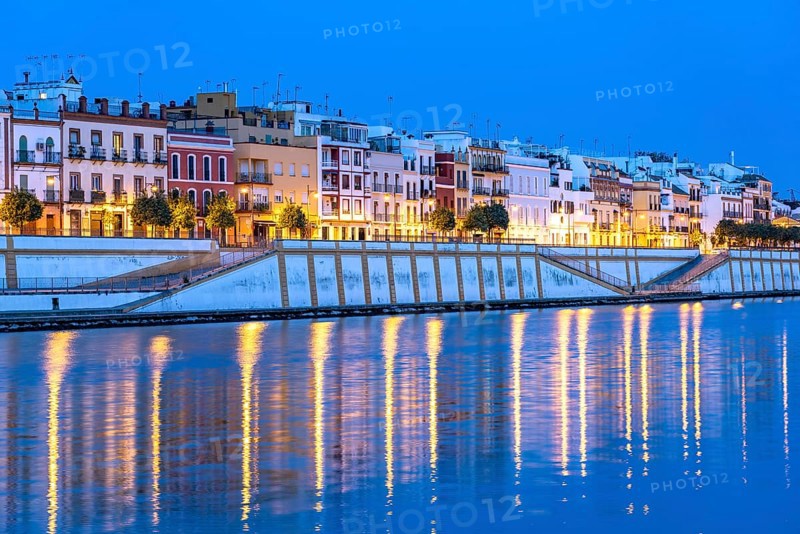 Triana neighbourhood on the banks of the Guadalquivir River at dusk