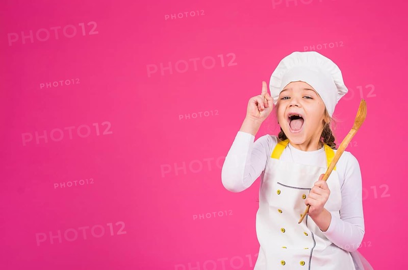 Girl cook ladle showing index finger