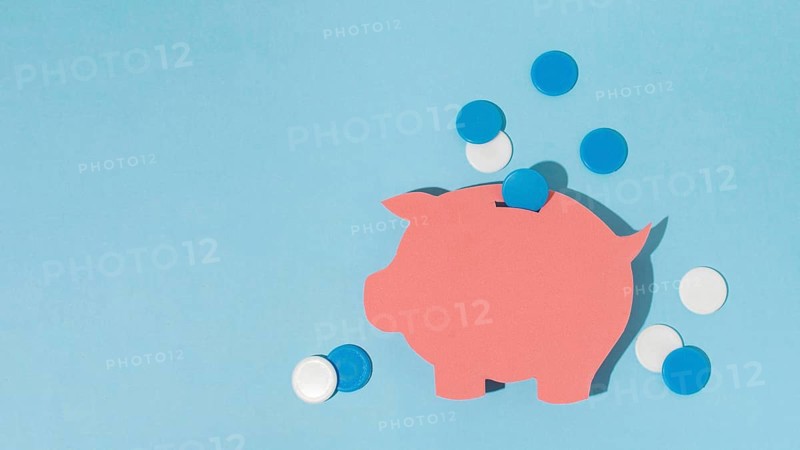 Top view piggy bank blue background